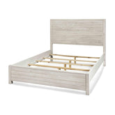 A bed featuring wooden slats and a sleek white headboard, designed for a modern bedroom aesthetic.